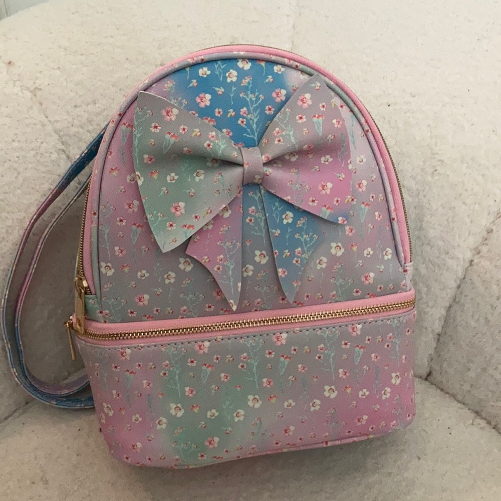 Under One Sky ombré pink, blue, and green floral mini backpack